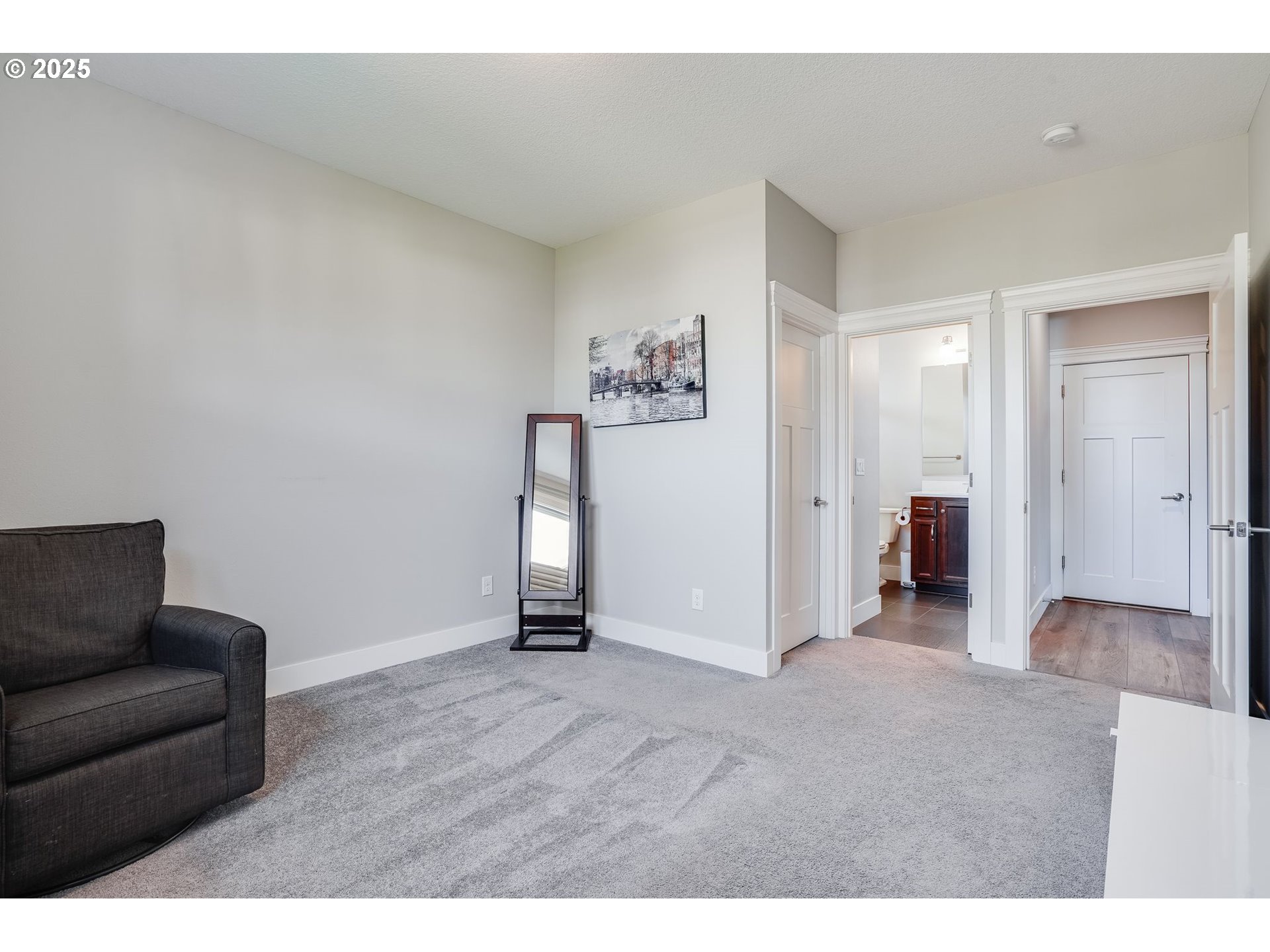 1709 South 43rd Place Ridgefield, WA 98642 - Photo 12 of 24 a living room with furniture and a flat screen tv