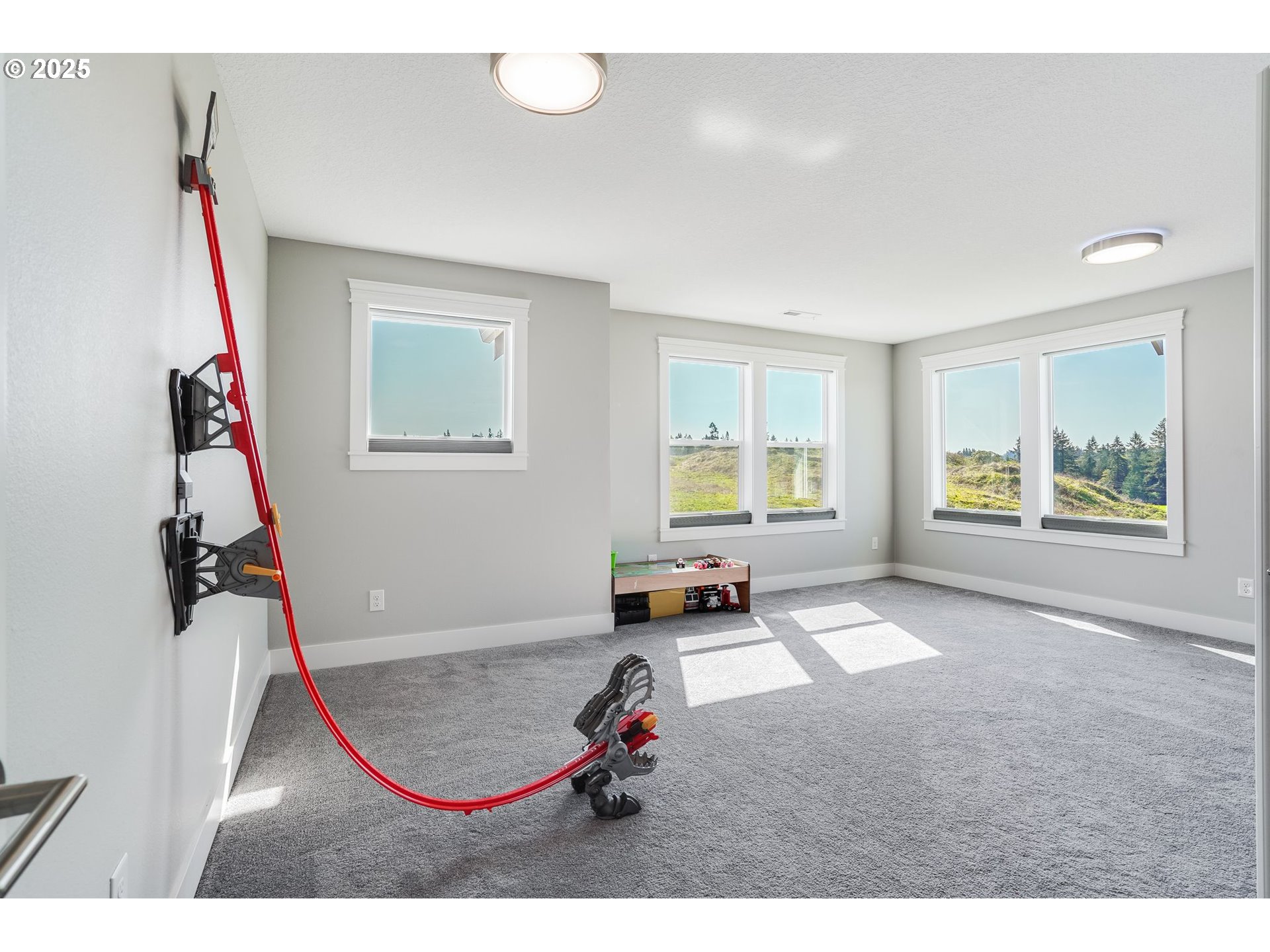 1709 South 43rd Place Ridgefield, WA 98642 - Photo 21 of 24 a living room with a couch and a window