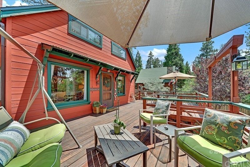 25454 Rim Rock Road Idyllwild, CA 92549 - Photo 1 of 1 a view of an outdoor sitting area with a couch