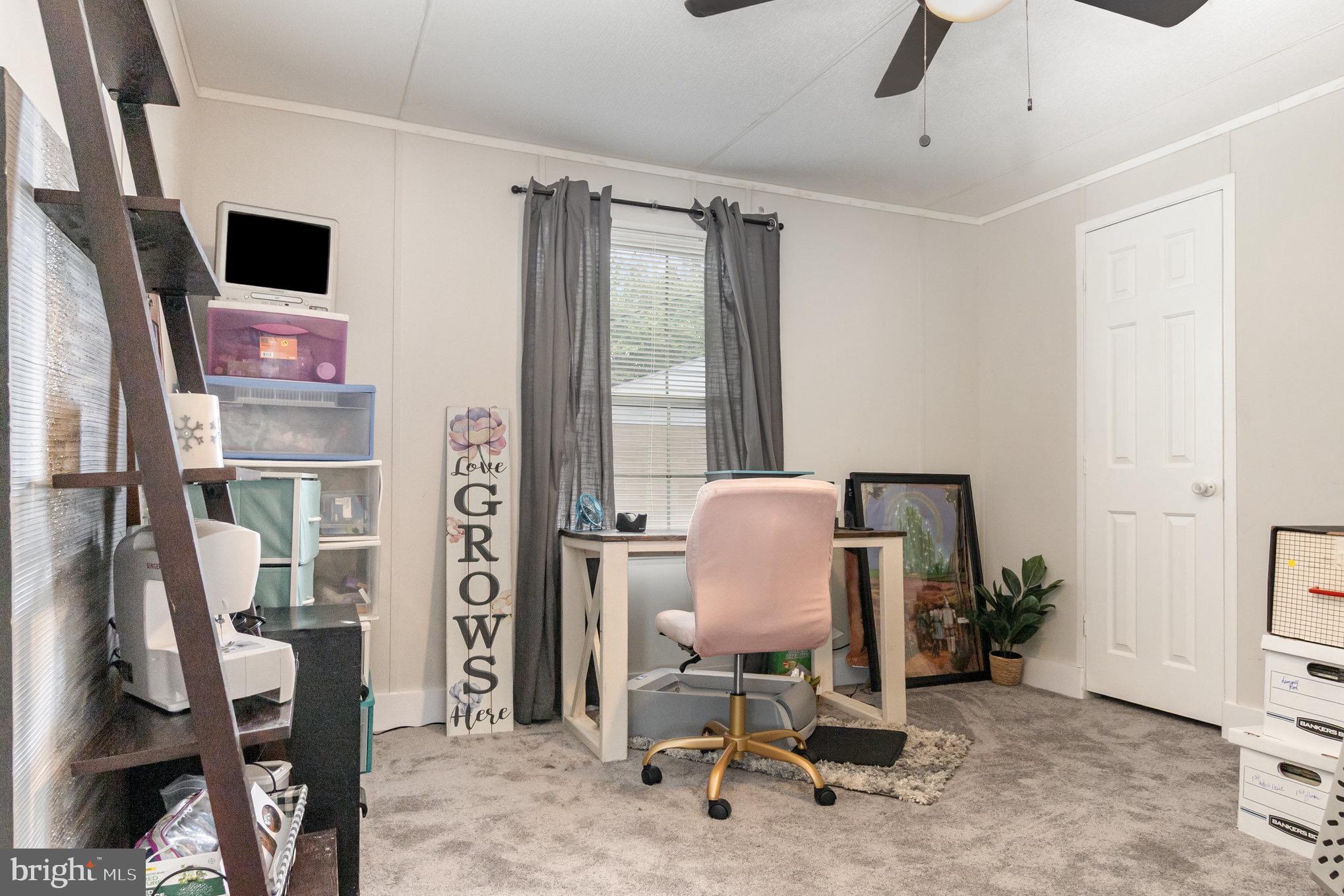 4041 Conowingo Road, Unit 30 Darlington, MD 21034 - Photo 17 of 40 a view of a workspace with furniture and a window