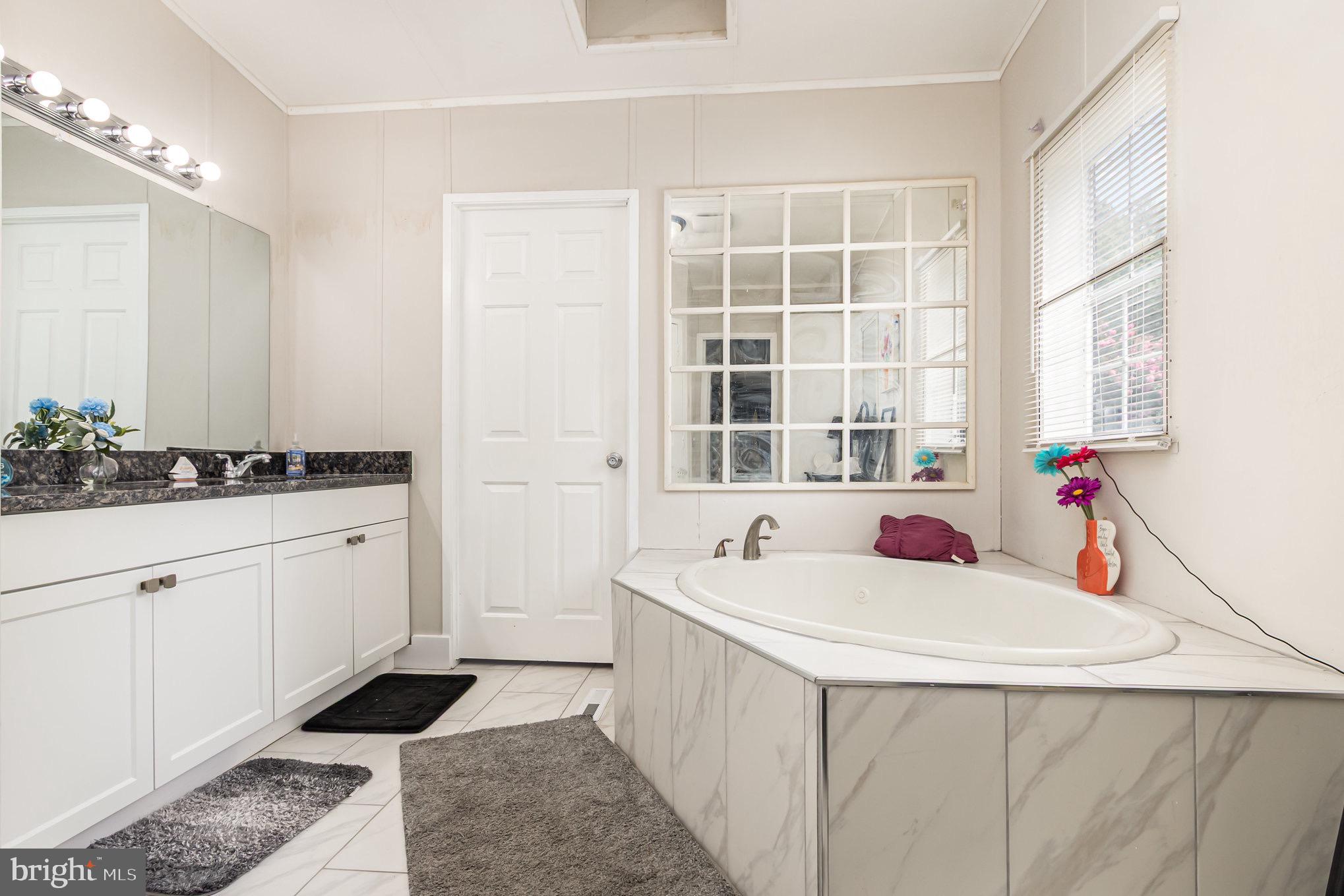 4041 Conowingo Road, Unit 30 Darlington, MD 21034 - Photo 21 of 40 a kitchen with a sink and a window