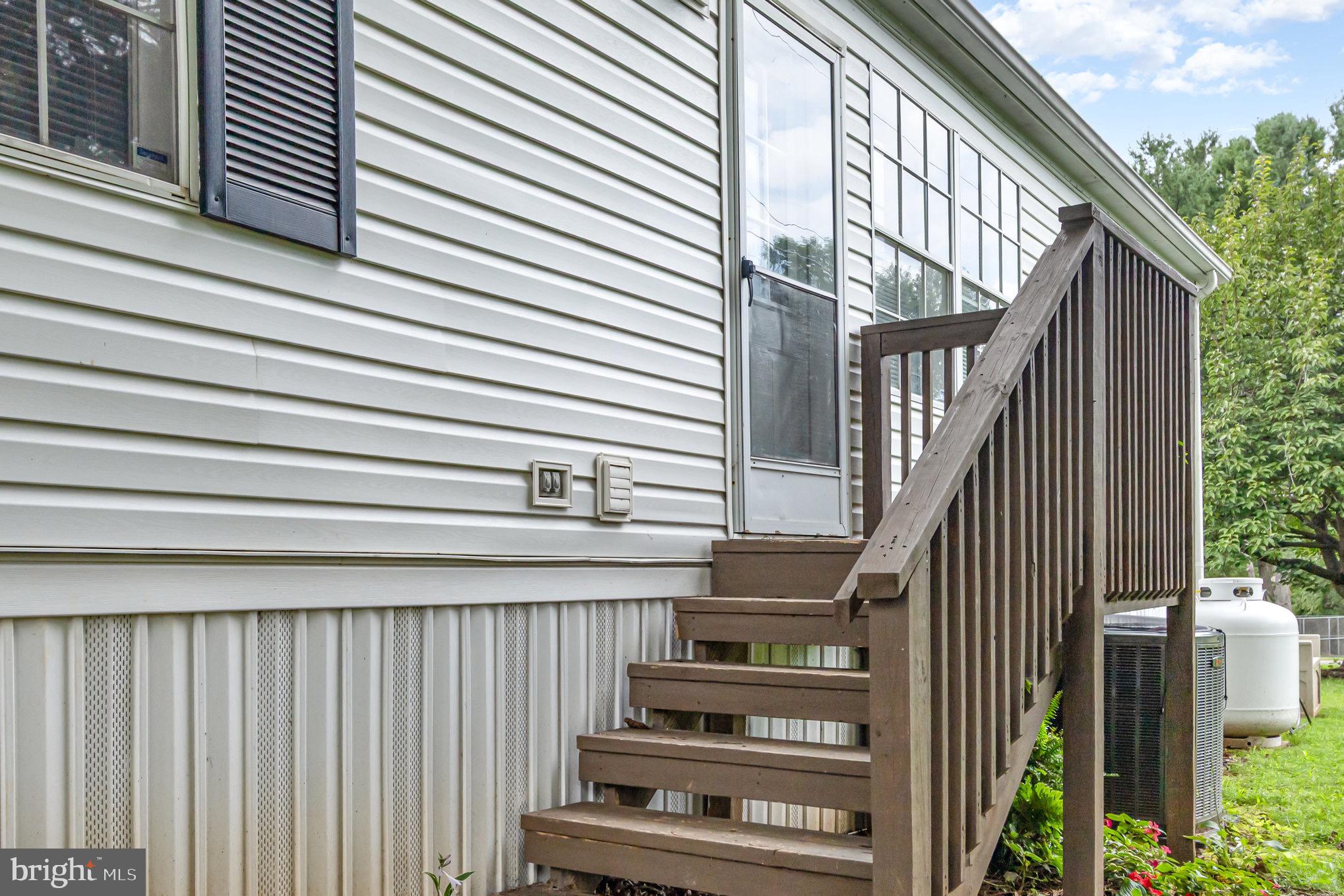 4041 Conowingo Road, Unit 30 Darlington, MD 21034 - Photo 28 of 40 a view of entryway with wooden floor and fence