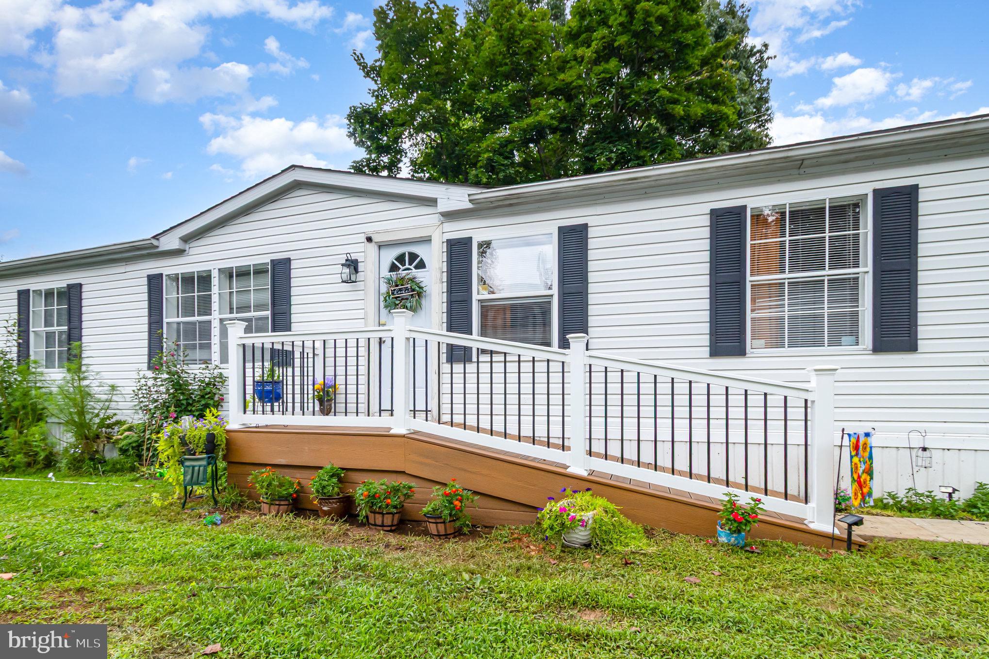 4041 Conowingo Road, Unit 30 Darlington, MD 21034 - Photo 5 of 40 a backyard of a house with a garden
