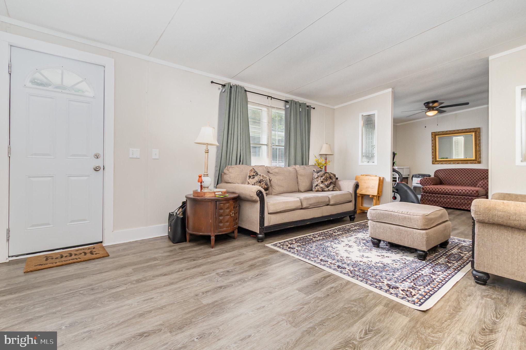 4041 Conowingo Road, Unit 30 Darlington, MD 21034 - Photo 8 of 40 a living room with furniture and a rug