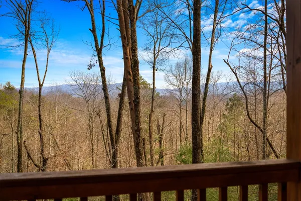 a view of a backyard of the house