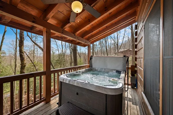 a outdoor living space with patio furniture and a fireplace