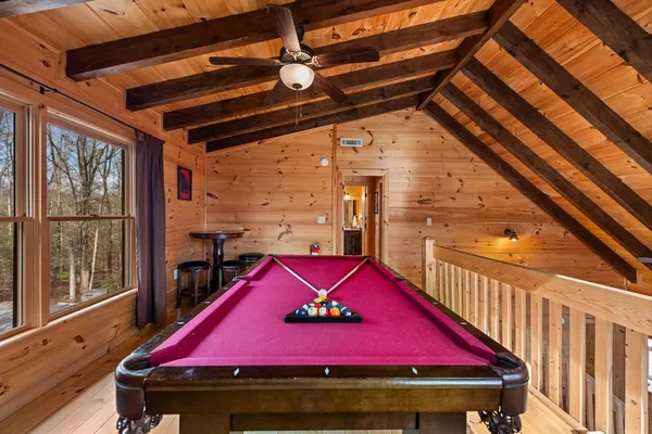 a view of a fireplace with furniture