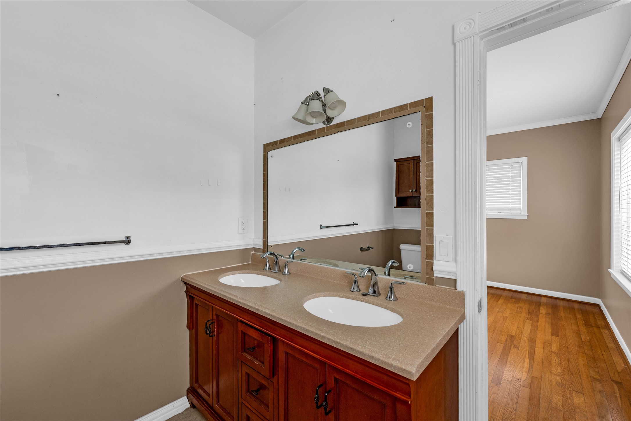 2527 Avenue G Rosenberg, TX 77471 - Photo 15 of 35 a bathroom with a sink and a mirror