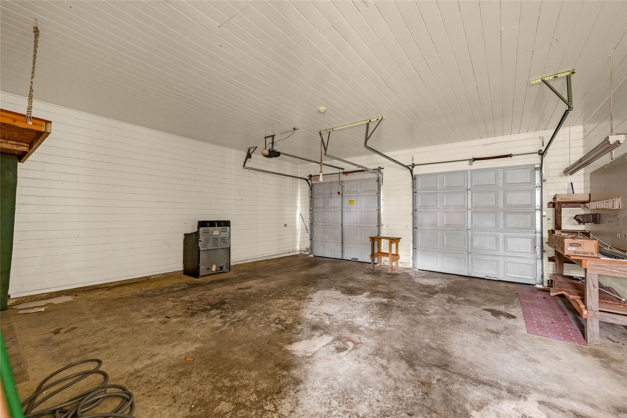 2527 Avenue G Rosenberg, TX 77471 - Photo 29 of 35 a view of a livingroom with a chair and a ceiling fan