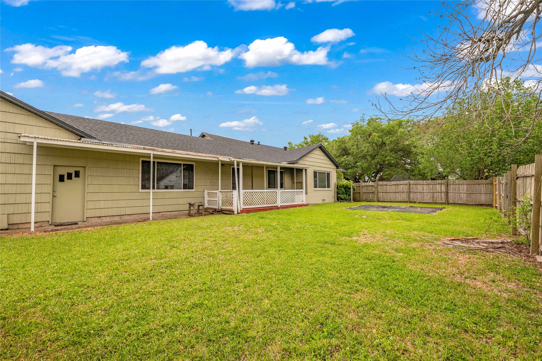 2527 Avenue G Rosenberg, TX 77471 - Photo 32 of 35 a view of a house with a backyard