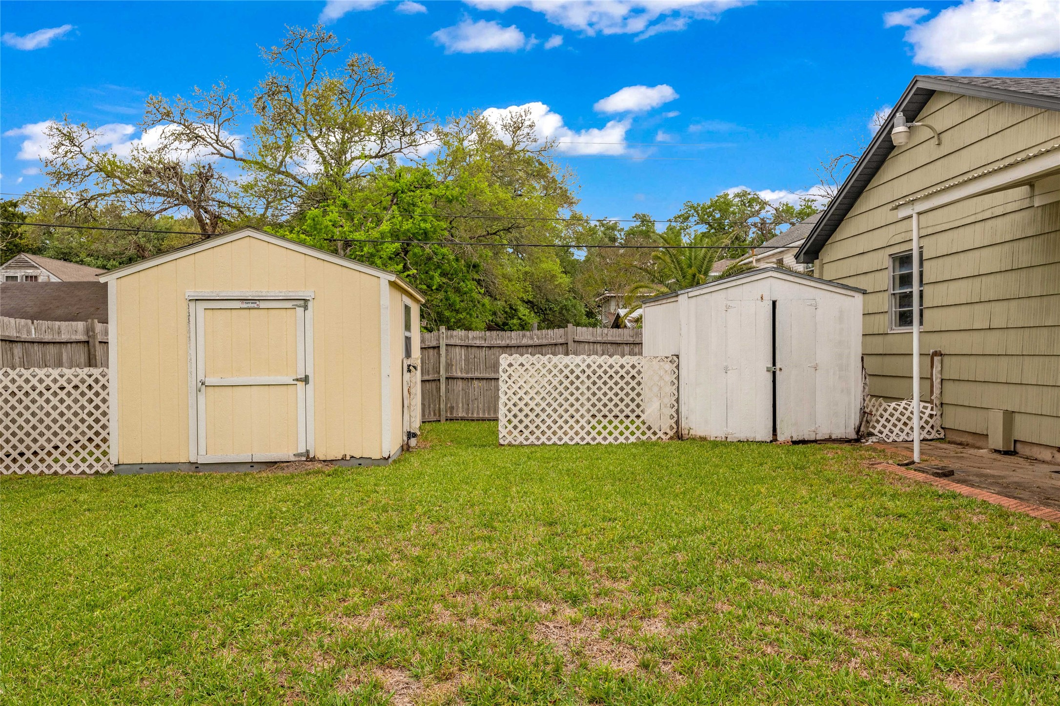 2527 Avenue G Rosenberg, TX 77471 - Photo 33 of 35 a view of a house with a yard