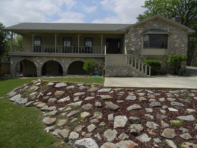 front view of a house with a small yard