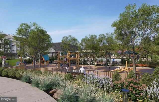 an aerial view of a house with swimming pool garden and patio