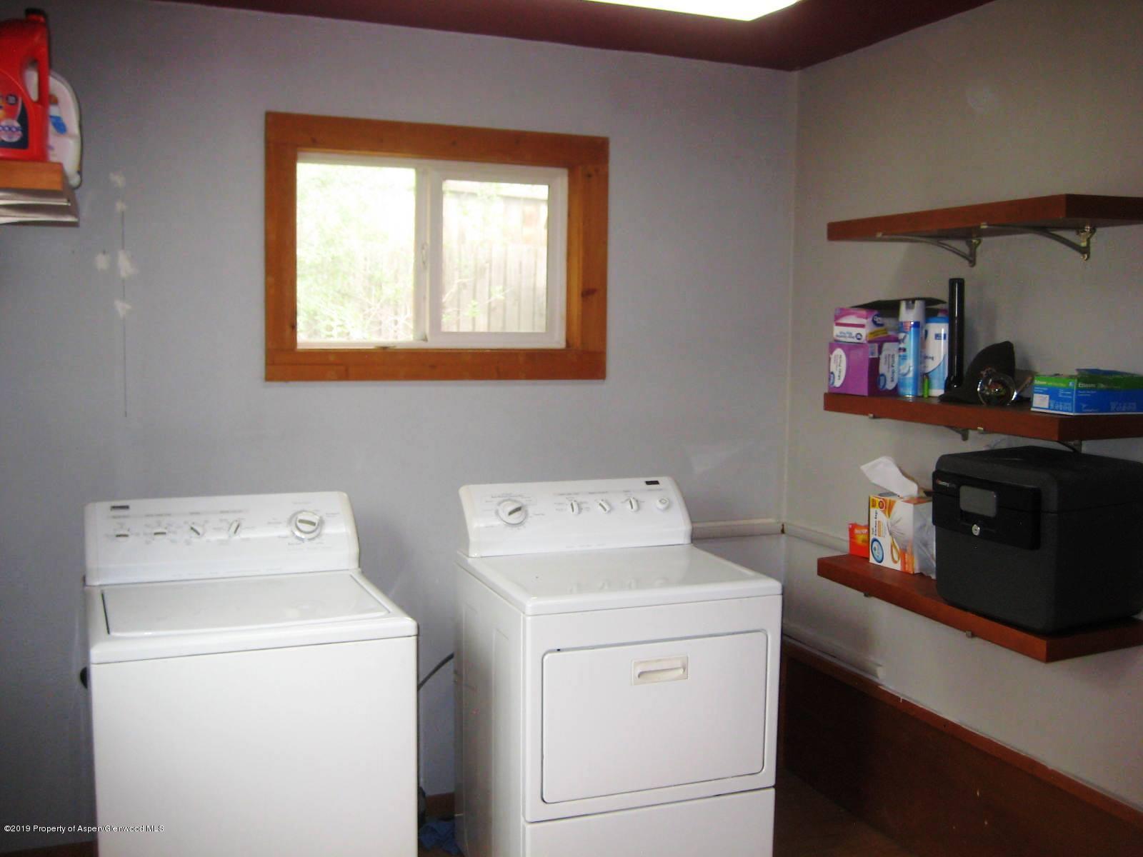 432 East 3rd Street Rifle, CO 81650 - Photo 14 of 20 a utility room with dryer and washer