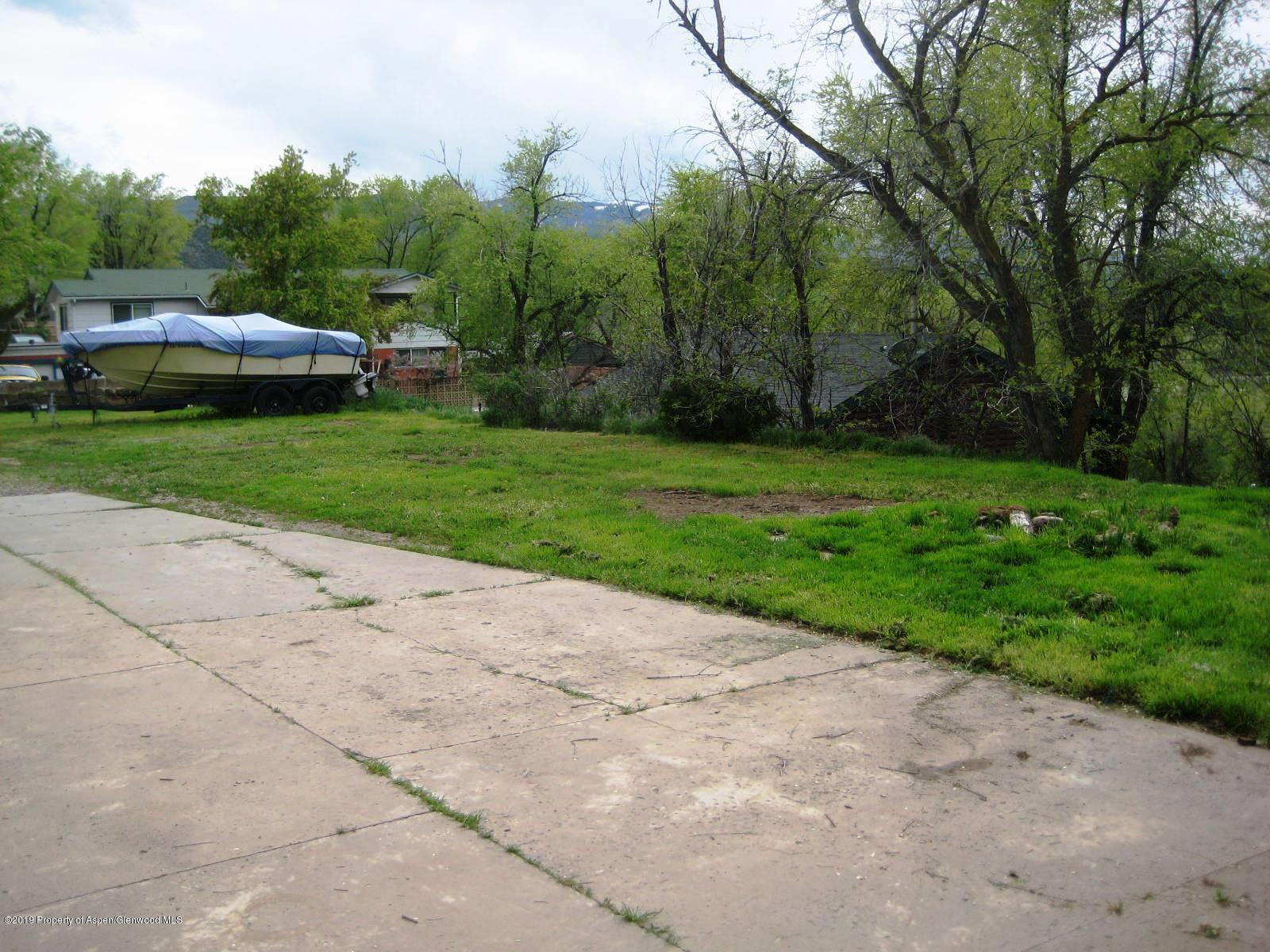 432 East 3rd Street Rifle, CO 81650 - Photo 20 of 20 a view of backyard with seating area and green space