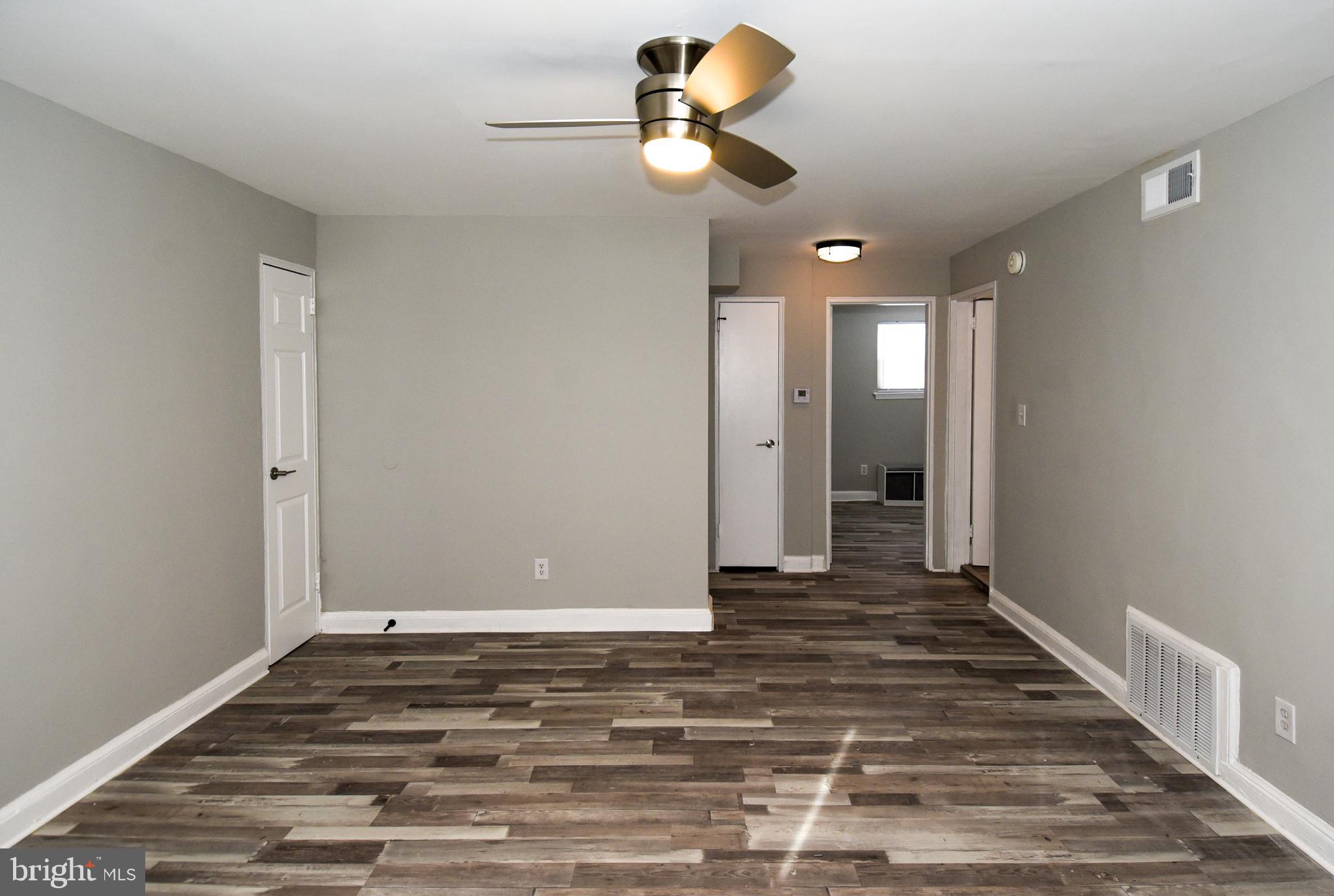 8208 Bellefonte Lane, Unit 5 Clinton, MD 20735 - Photo 4 of 17 Spacious, modern living area with natural light.