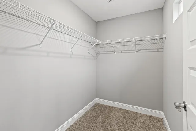 a view of a room with racks on the wall