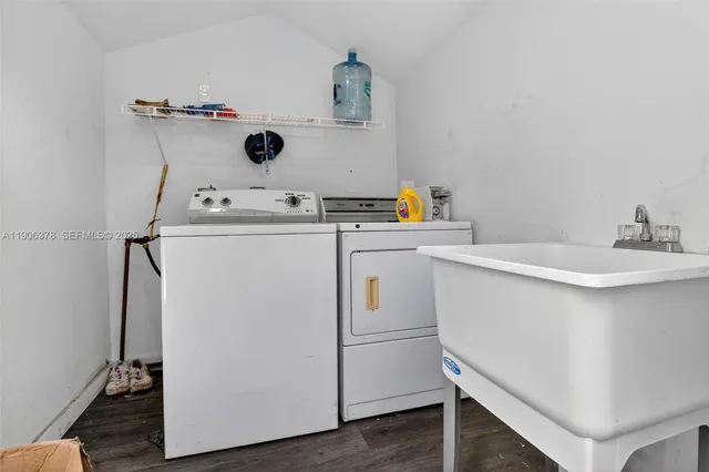 a utility room with dryer and washer