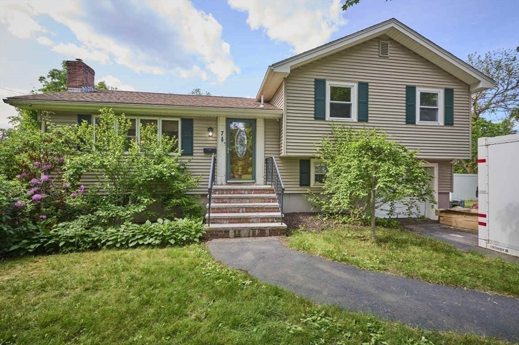 7 Lasallette Road Billerica, MA 01821 - Photo 1 of 35 a front view of a house with a yard