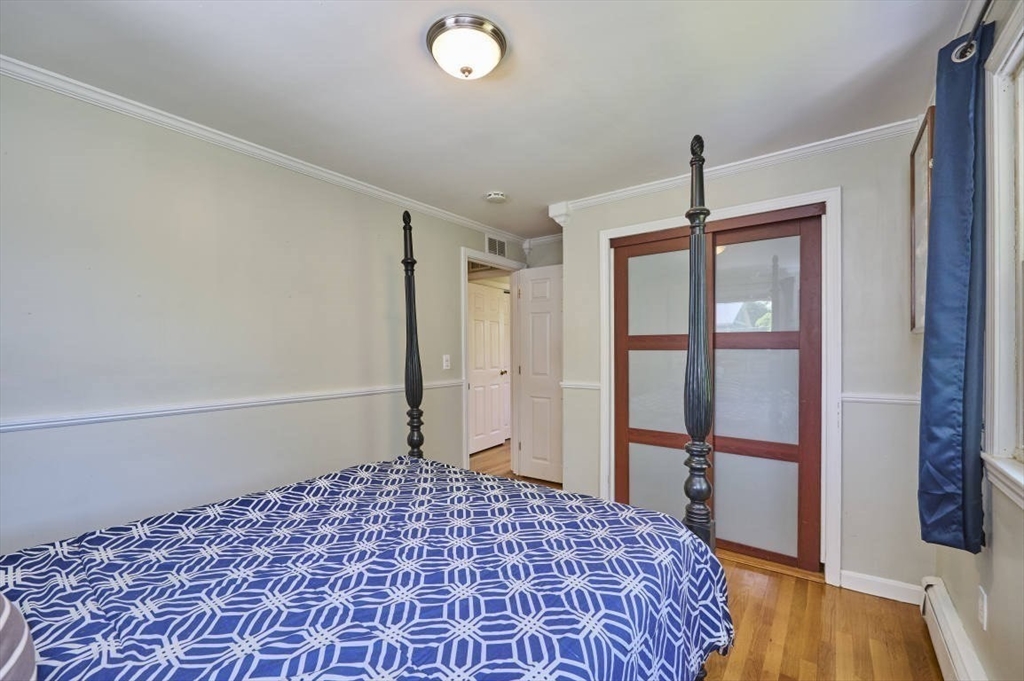 7 Lasallette Road Billerica, MA 01821 - Photo 16 of 35 a bedroom with a bed and a window