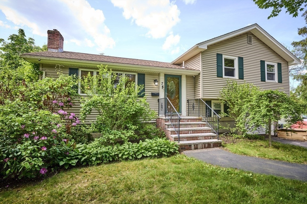 7 Lasallette Road Billerica, MA 01821 - Photo 2 of 35 a front view of a house with a yard