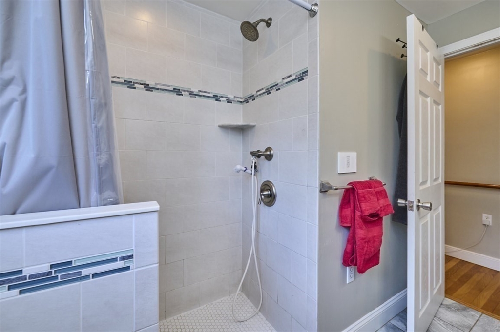 7 Lasallette Road Billerica, MA 01821 - Photo 22 of 35 a bathroom with a shower curtain and a shower curtain