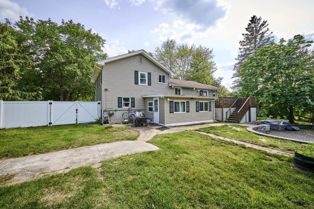 7 Lasallette Road Billerica, MA 01821 - Photo 3 of 35 a view of a house with a yard and sitting area