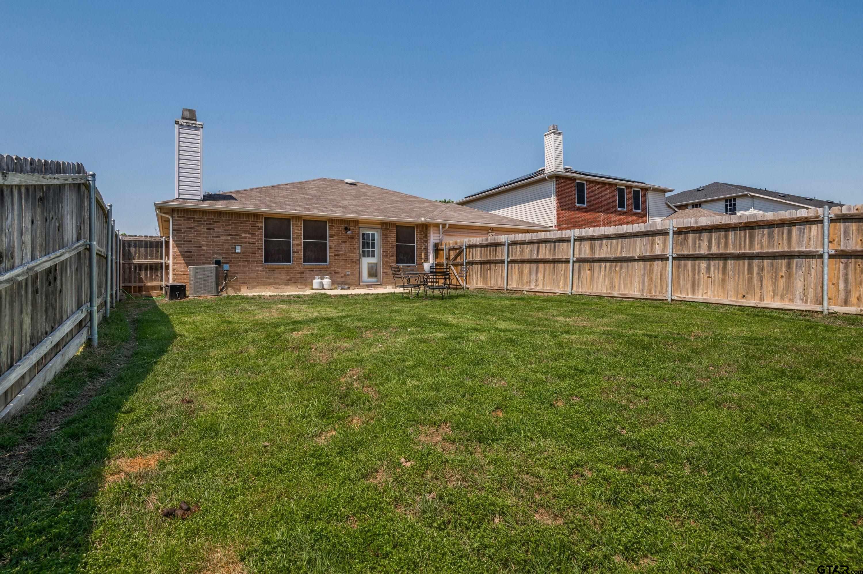 2748 Cameron Way Mesquite, TX 75181 - Photo 23 of 25 a front view of a house with a yard