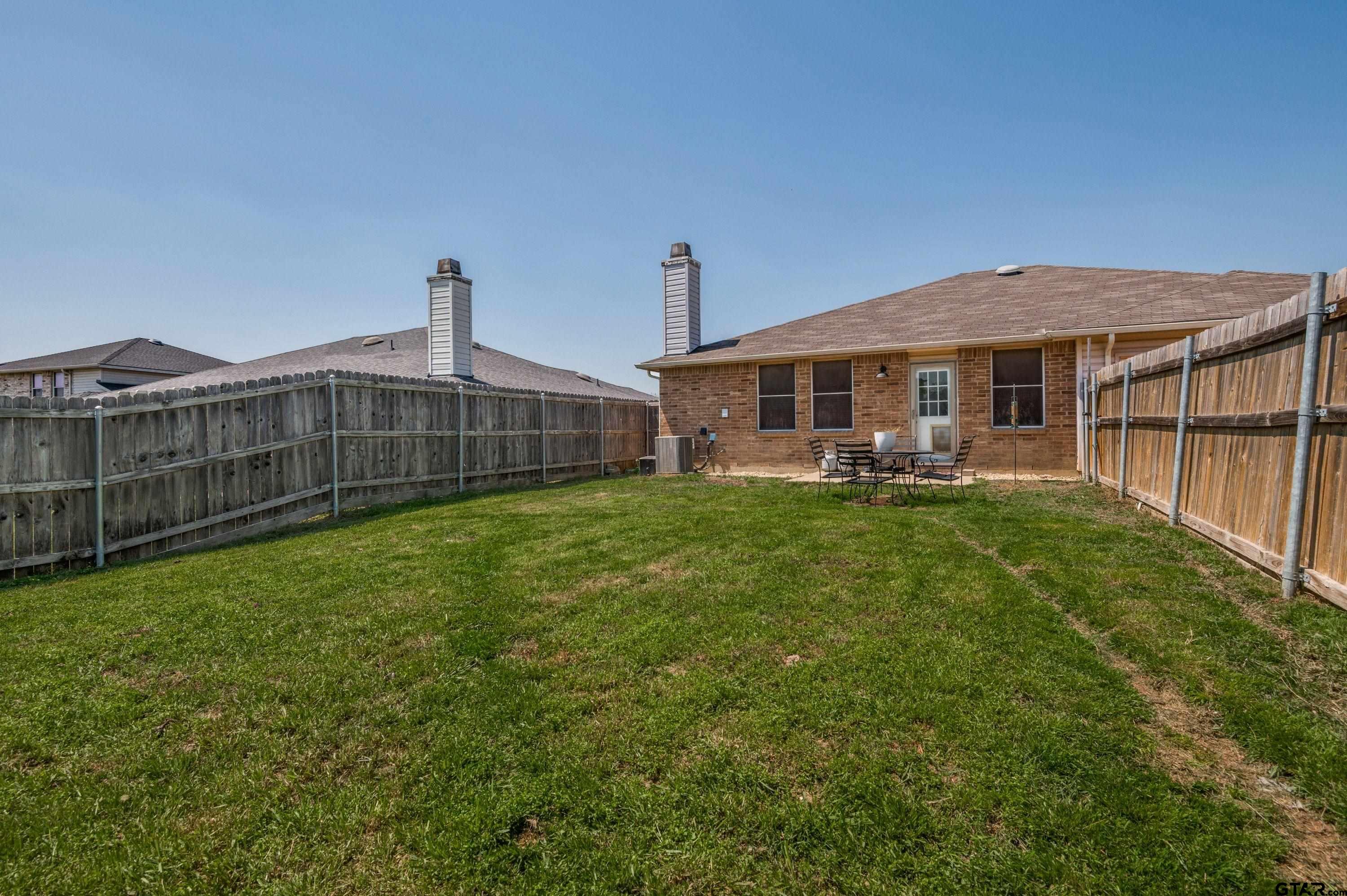 2748 Cameron Way Mesquite, TX 75181 - Photo 24 of 25 a view of a house with a big yard and large trees