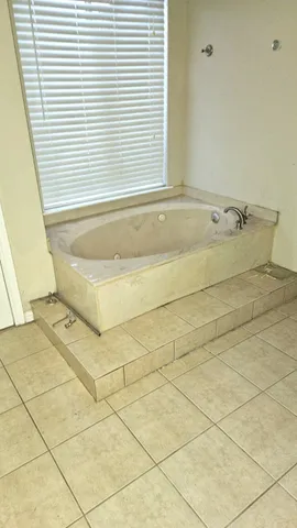 a bathroom with a bathtub