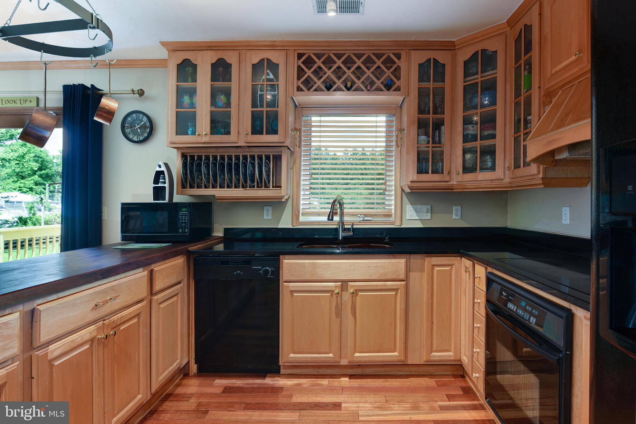 104 River Road Elkton, MD 21921 - Photo 16 of 22 Wood cabinets and granite counters