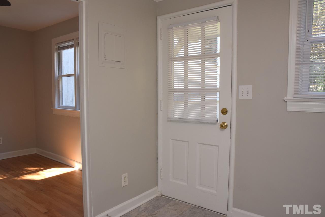1057 Nichols Drive Raleigh, NC 27605 - Photo 16 of 39 a view of an empty room with a window