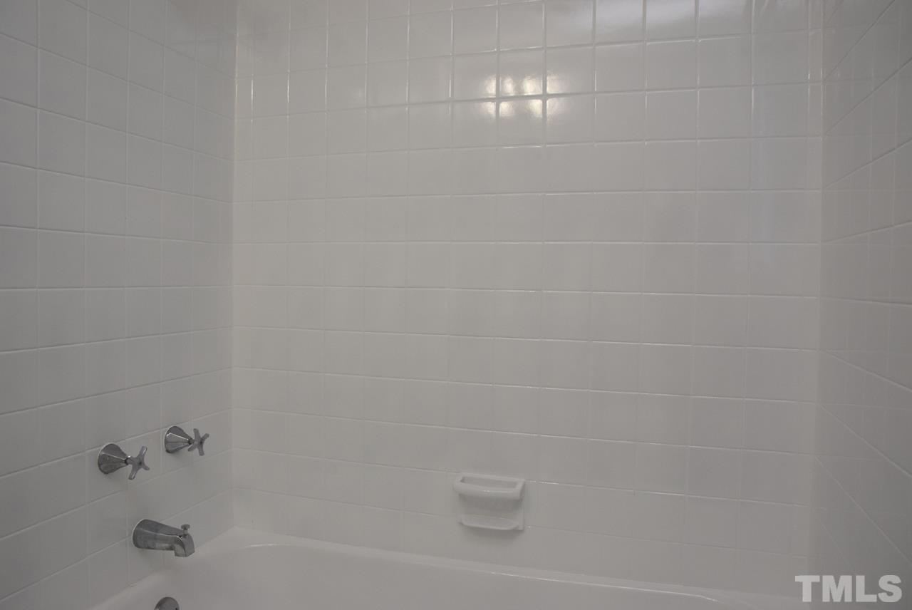 1057 Nichols Drive Raleigh, NC 27605 - Photo 26 of 39 a bathroom with a bathtub