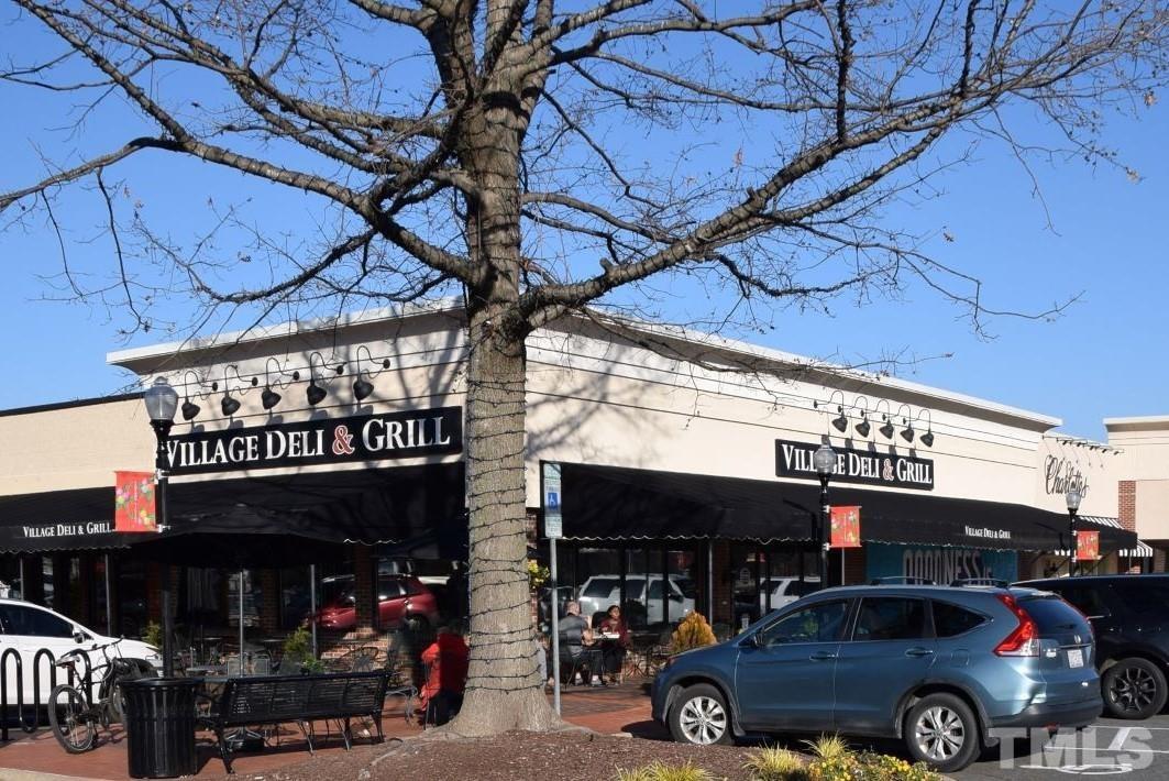 1057 Nichols Drive Raleigh, NC 27605 - Photo 28 of 39 a view of a street with cars