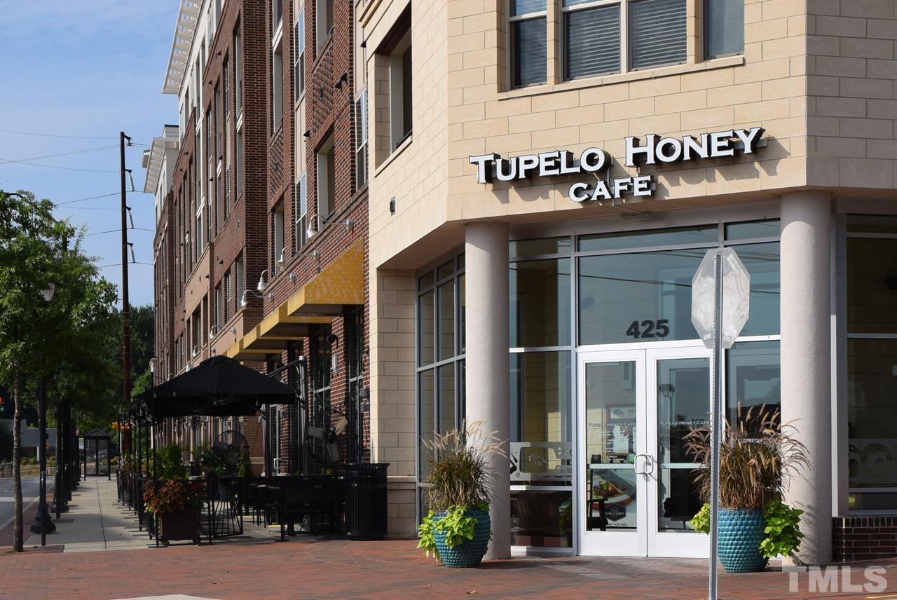 1057 Nichols Drive Raleigh, NC 27605 - Photo 31 of 39 a front view of a building with street