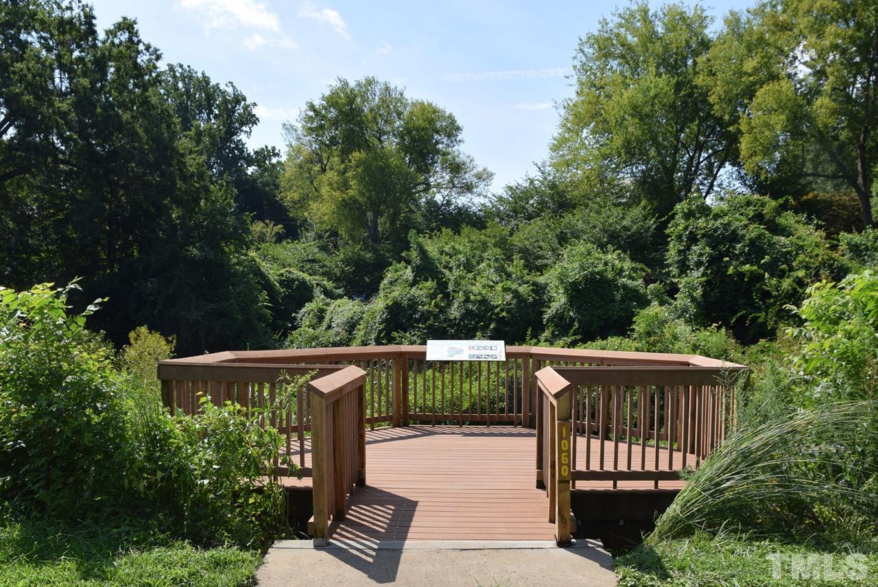 1057 Nichols Drive Raleigh, NC 27605 - Photo 34 of 39 a view of backyard with seating and green space