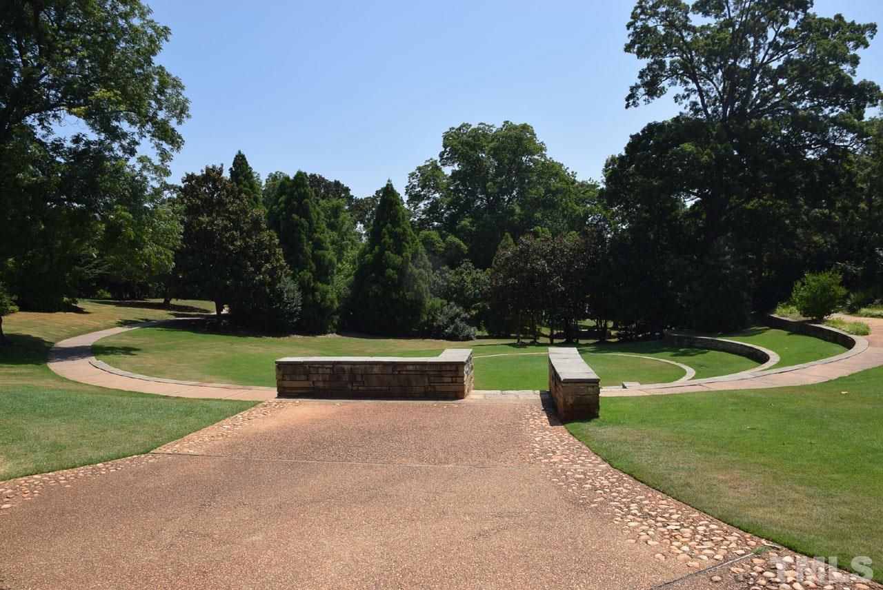 1057 Nichols Drive Raleigh, NC 27605 - Photo 35 of 39 a view of swimming pool with a yard