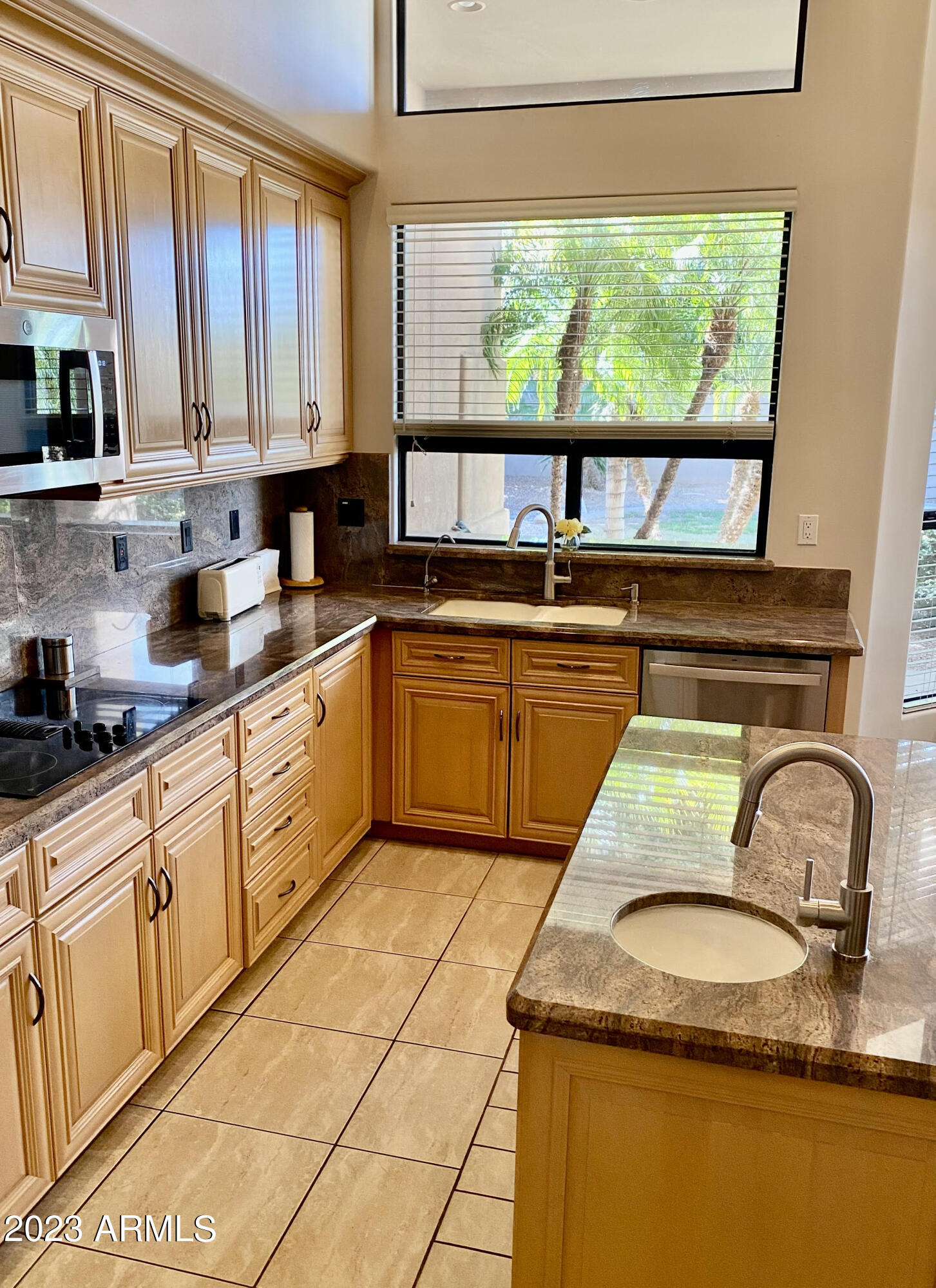 4055 North Recker Road, Unit 54 Mesa, AZ 85215 - Photo 12 of 32 KITCHEN SIDE 3-19-2023