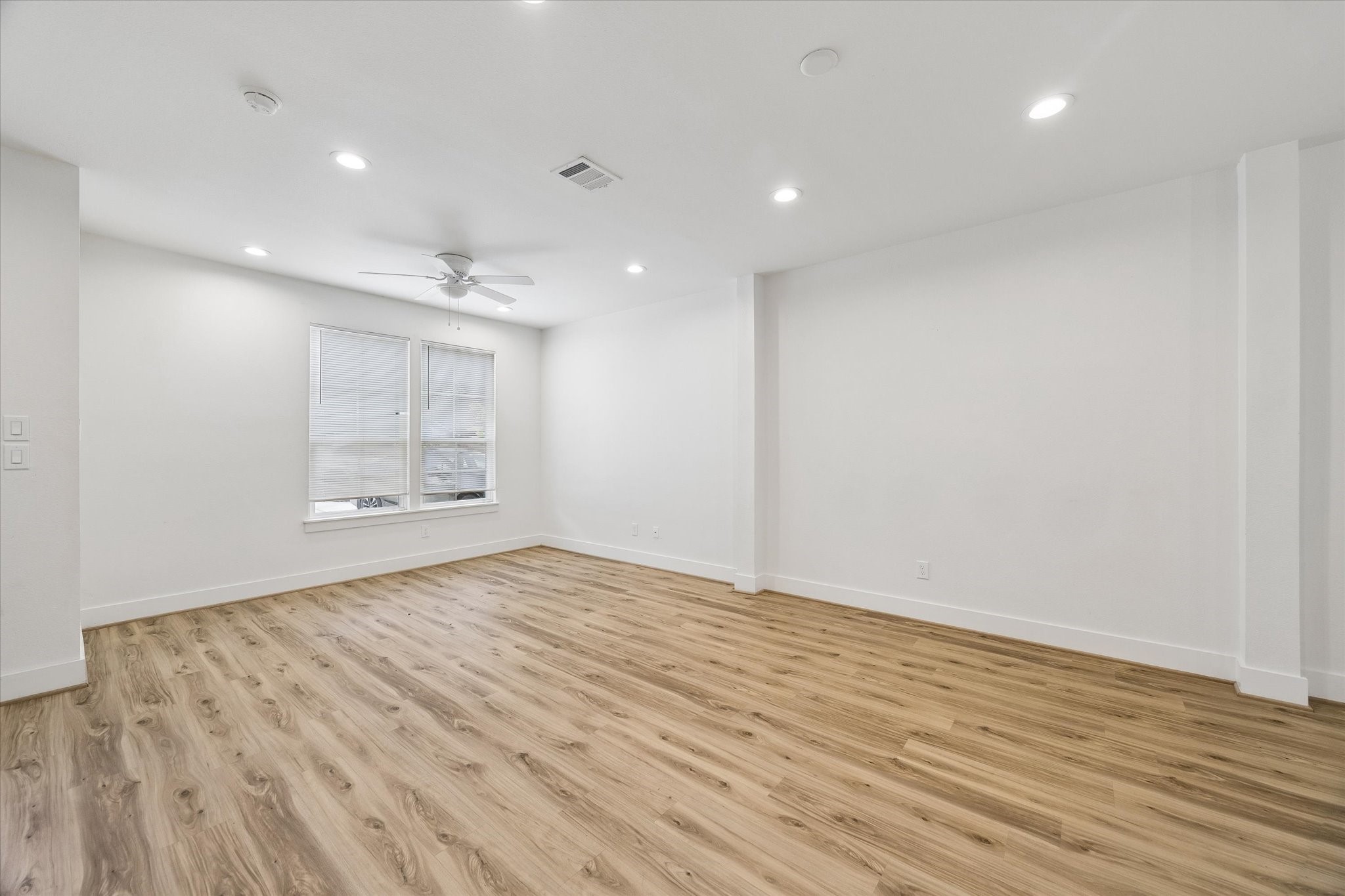 2749 Redrock Street, Unit B Houston, TX 77088 - Photo 6 of 24 Another view of the large living room- plenty of space for furniture placement & decorating theme opportunities.