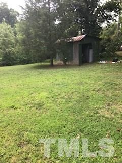 3716 Buffaloe Road Raleigh, NC 27604 - Photo 9 of 10 a view of a backyard of the house