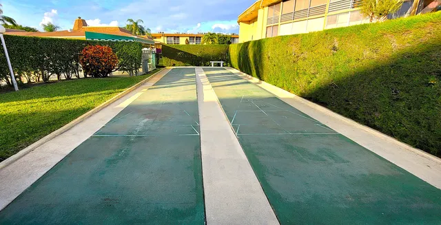 a view of swimming pool with a yard