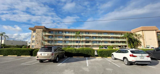 a car parked in front of a building