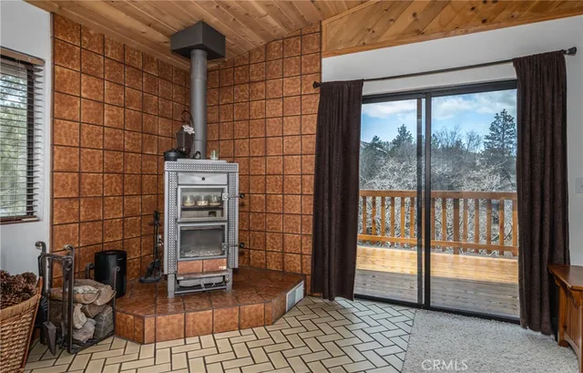 a living room with furniture ceiling fan and a rug