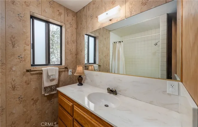 a bed room with a bed and a couch