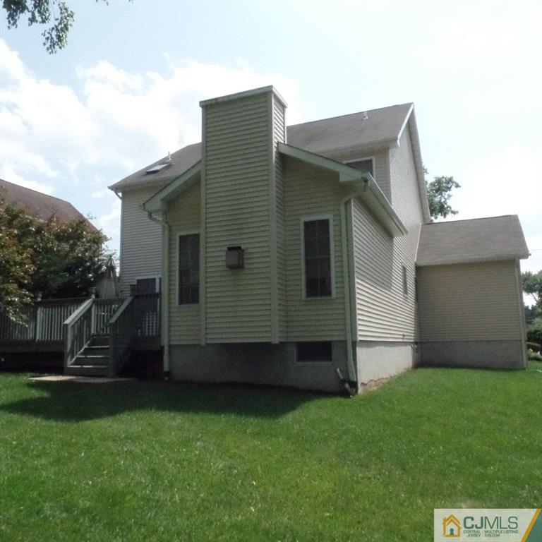 130 Dover Road Colonia, NJ 07067 - Photo 2 of 23 a view of house with backyard