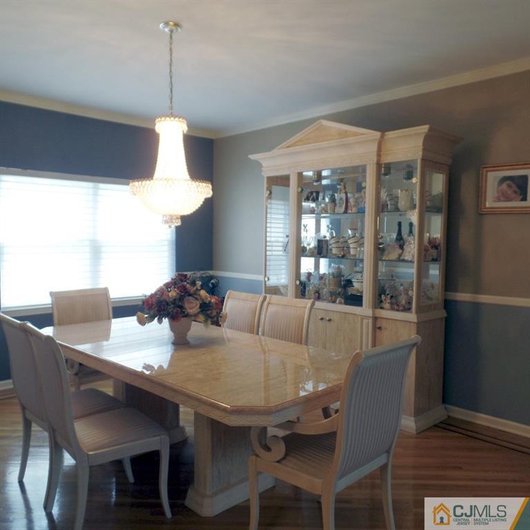 130 Dover Road Colonia, NJ 07067 - Photo 6 of 23 a view of a dining room with furniture window and outside view