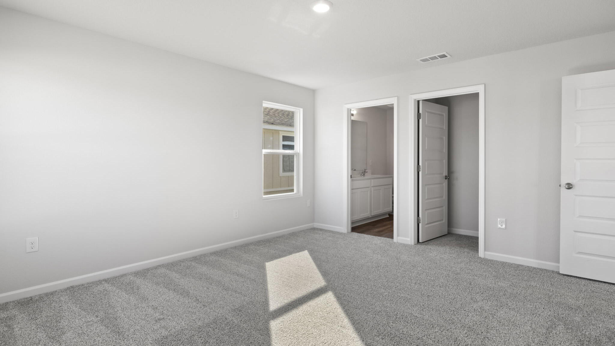 51 Foxtrail Run Freeport, FL 32439 - Photo 20 of 21 an empty room with windows and closet