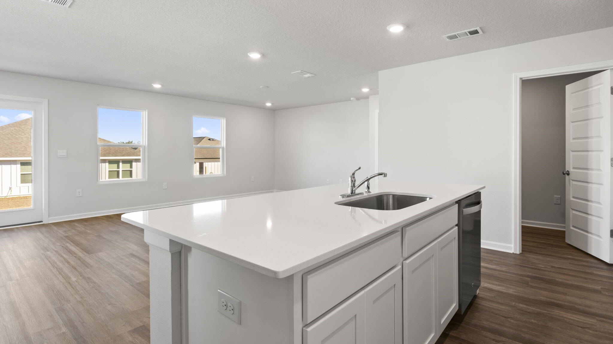 51 Foxtrail Run Freeport, FL 32439 - Photo 9 of 21 a kitchen with a sink a window and stainless steel appliances