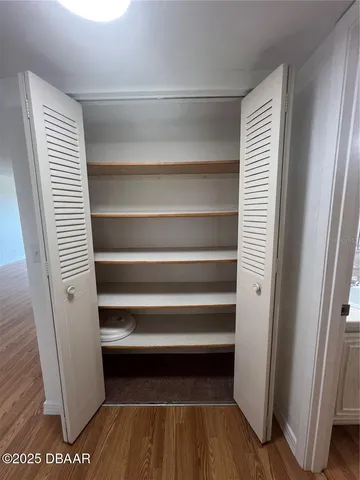 a kitchen with a refrigerator and a sink