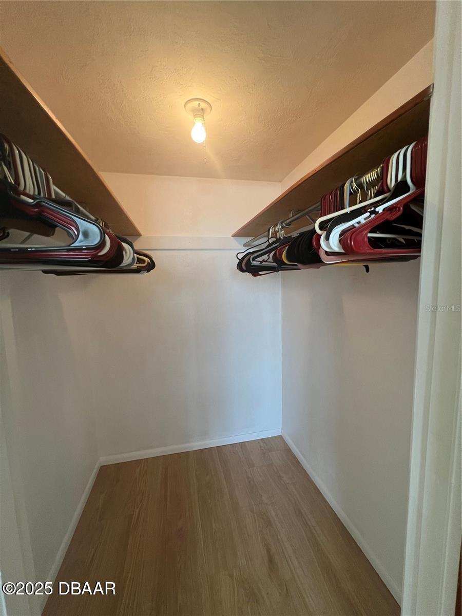 2711 North Halifax Avenue, Unit 593 Daytona Beach, FL 32118 - Photo 23 of 42 a view of walk in closet
